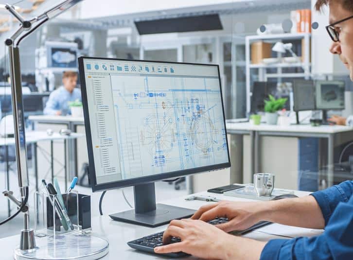 Looking at design specs on a computer